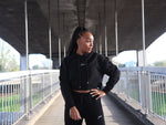 Women's tracksuit in black with embroidery signature